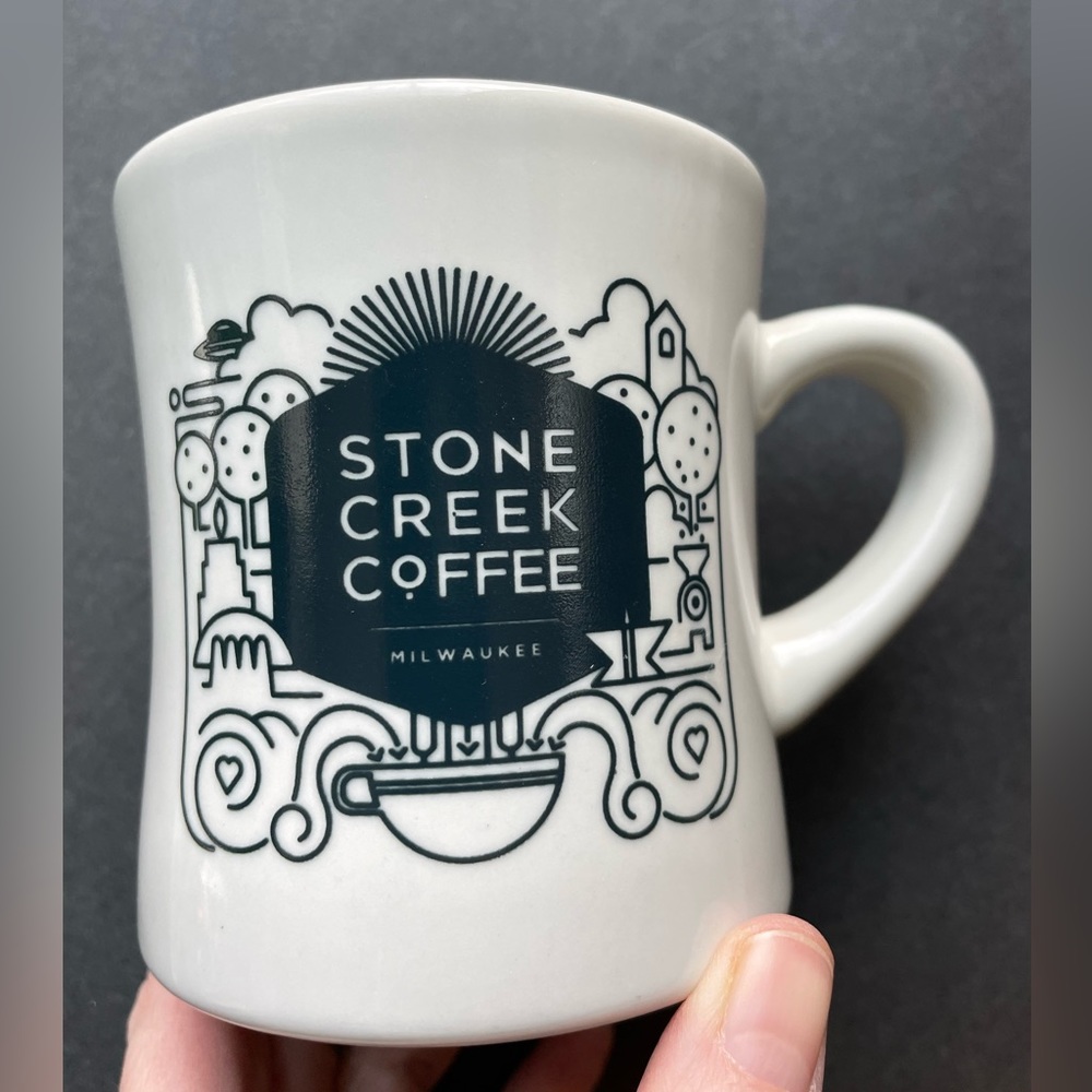 Stone Creek Coffee white and black ceramic mug. Milwaukee